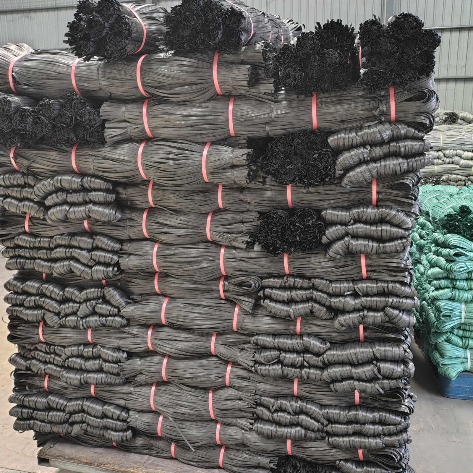 Finished black and green tying materials stored in the factory